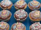 Muffins Muffins mit Streuseln und Einhorn-Bild